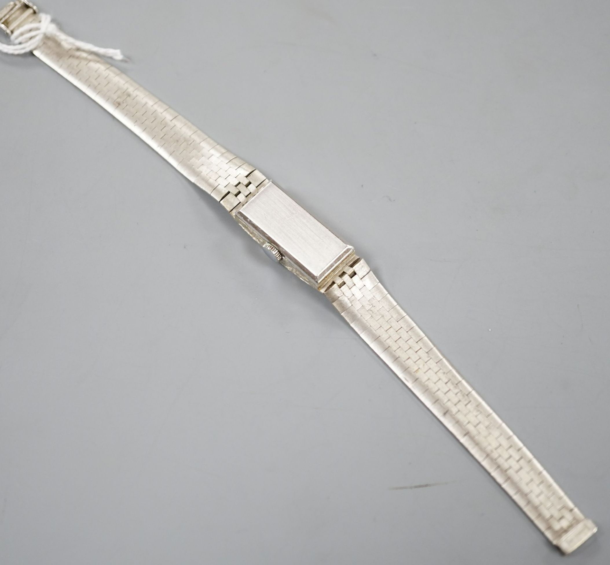 A lady's 1960's textured 9ct white gold Bueche Girod manual wind bracelet wrist watch, 16.5cm